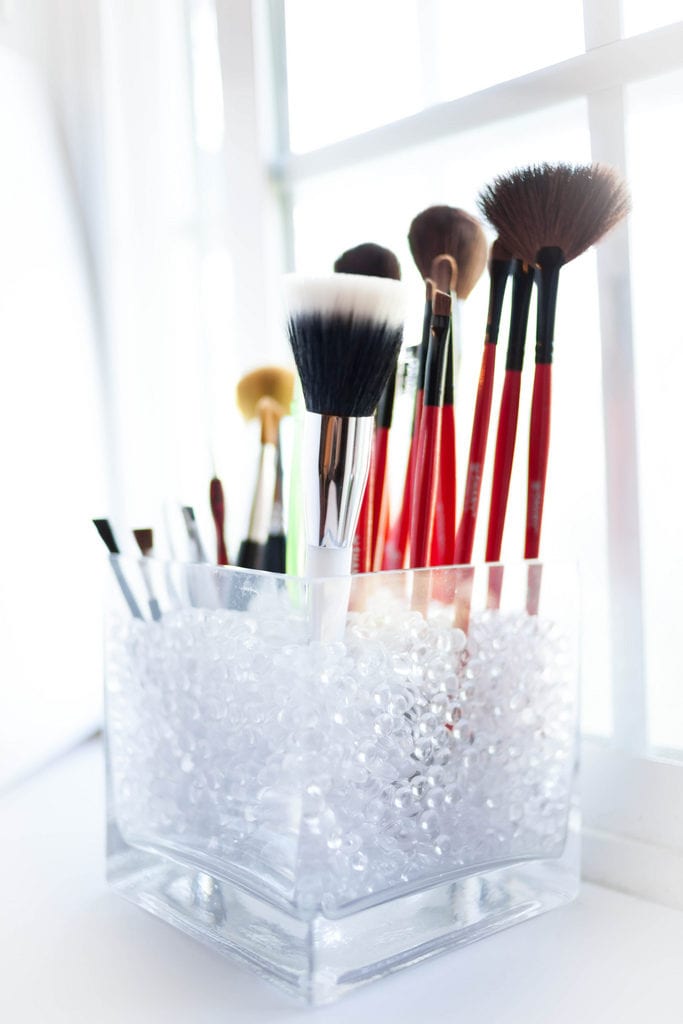 Multiple makeup brushes. 