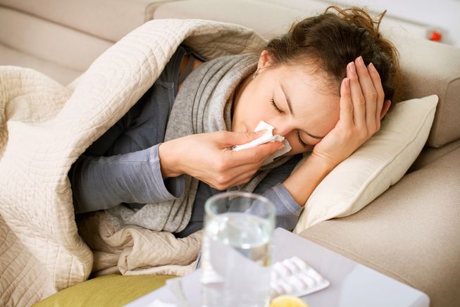 Woman sick with the flu