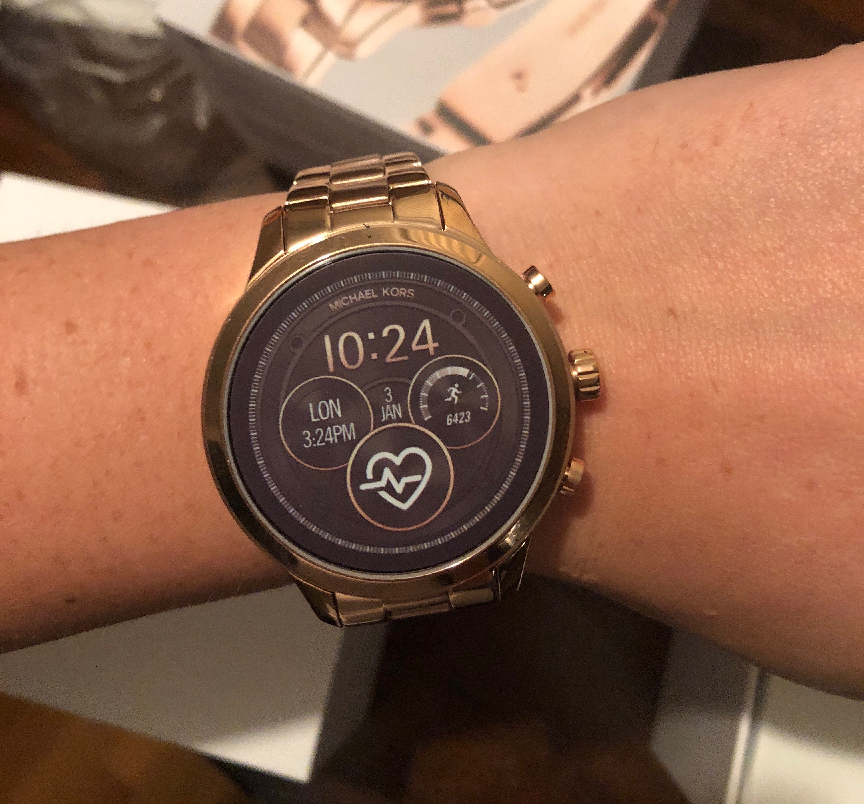 how do i connect my michael kors smartwatch to my phone