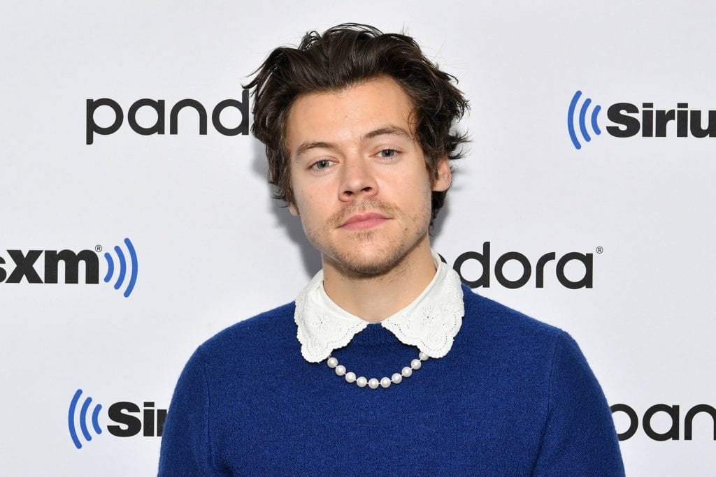 Harry in pearls and Peter Pan collar