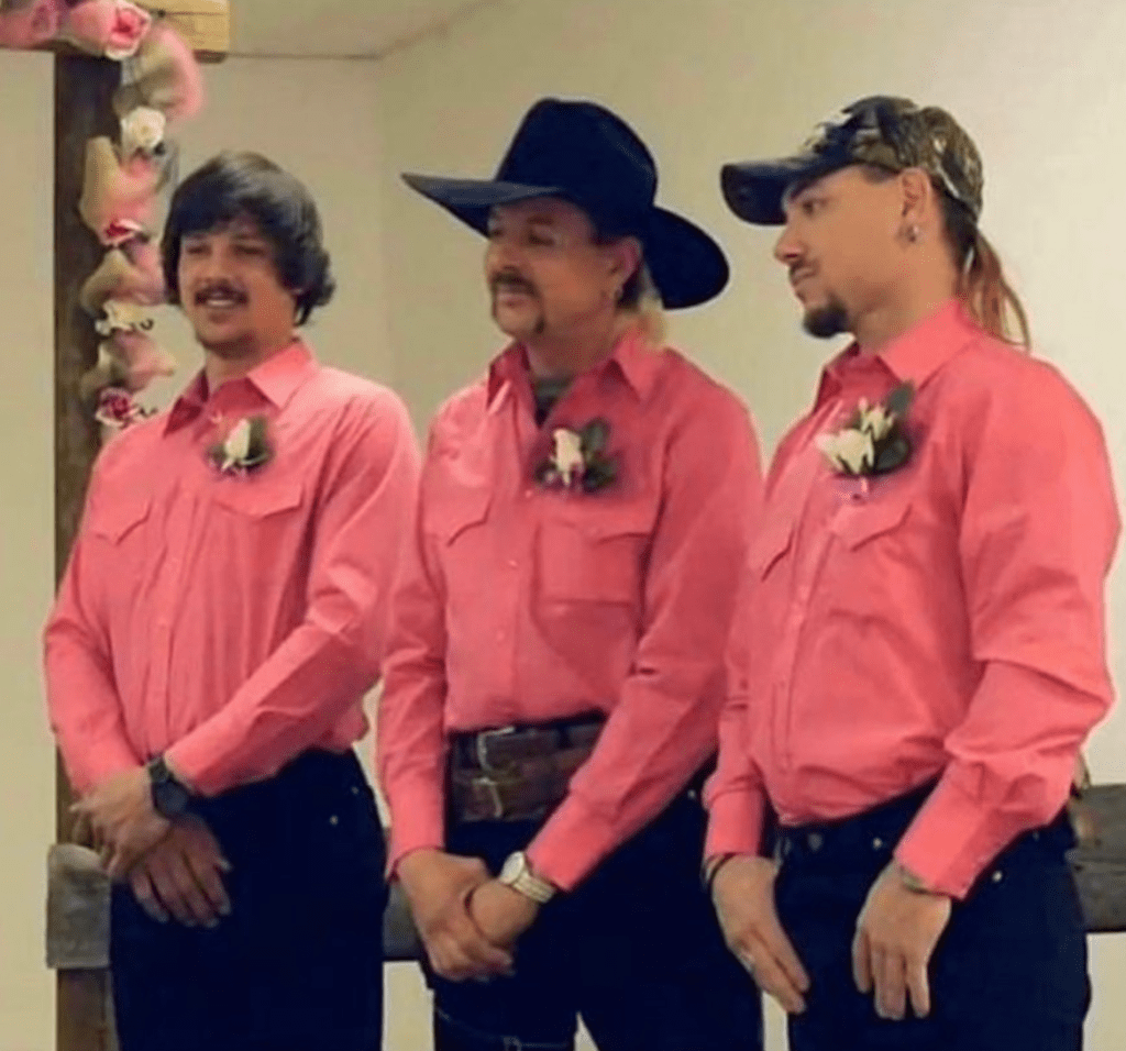 Travis, Joe, and John at their wedding dressed in matching pink shirts