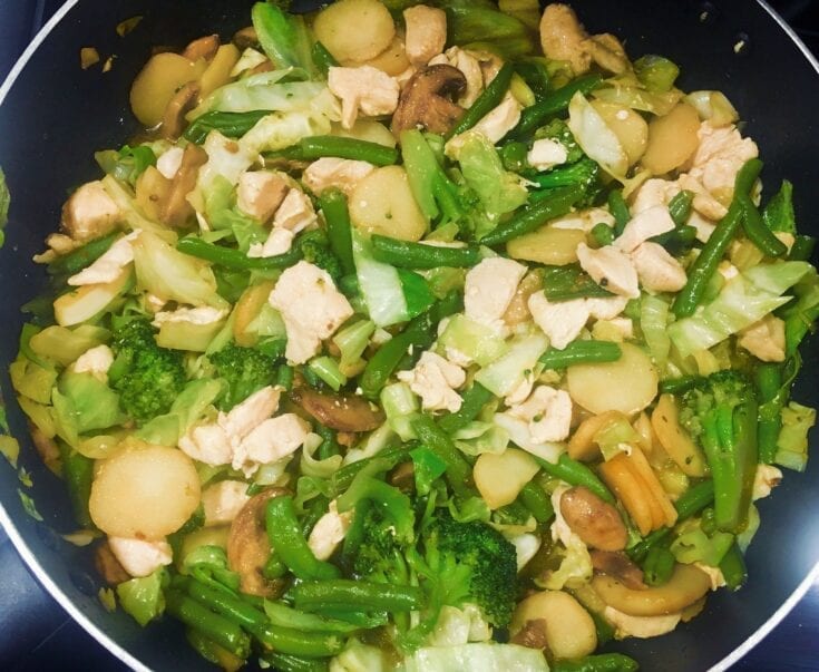A Weight Watchers stir-fry loaded with food.