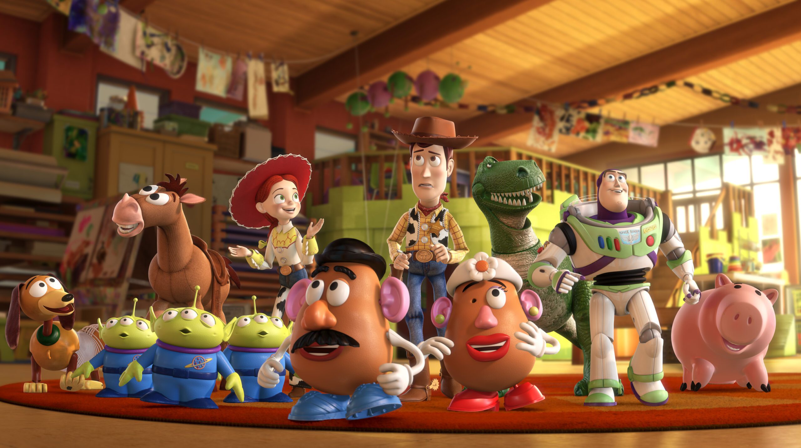 A group of toy story characters, considered one of the best movies, are standing in a room.