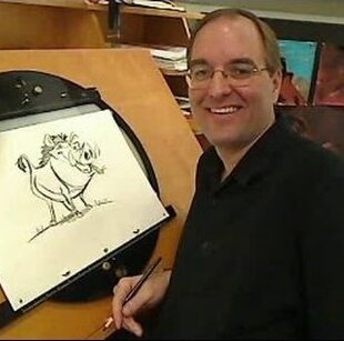 A man is drawing a cartoon character in front of an easel.