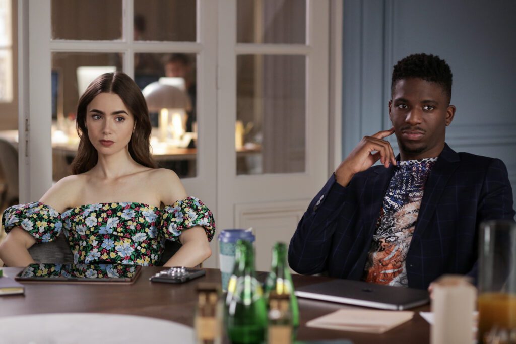 (L to R) LILY COLLINS as EMILY and SAMUEL ARNOLD as LUKE in episode 103 of EMILY IN PARIS.