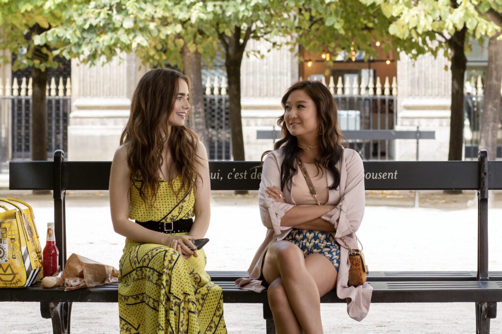 (L to R) LILY COLLINS as EMILY and ASHLEY PARK as MINDY CHEN in episode 101 of EMILY IN PARIS. 