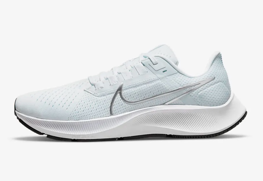 Nike Air Zoom Pegasus 38. Light blue shoe with white sole. 