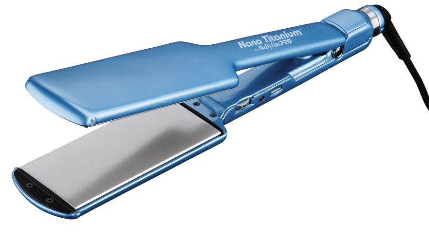 Nano Titanium is a flat iron with wider ceramic plates. It is a ocean blue, with silver ceramic plates. The controls and charging port are located on the side.