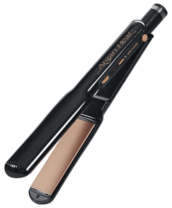 Argan Heat is a black flat iron with rose gold accents. It is on the slimmer side. It has a power button and temperature dial on its side. 