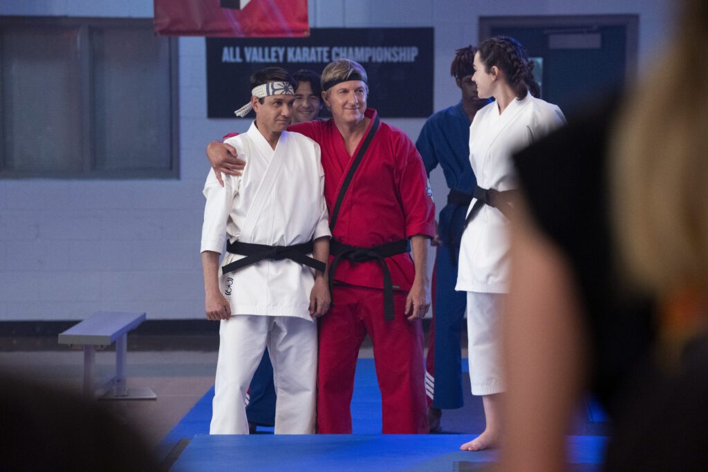 Ralph Macchio as Daniel LaRusso, William Zabka as Johnny Lawrence, Mary Mouser as Samantha LaRusso