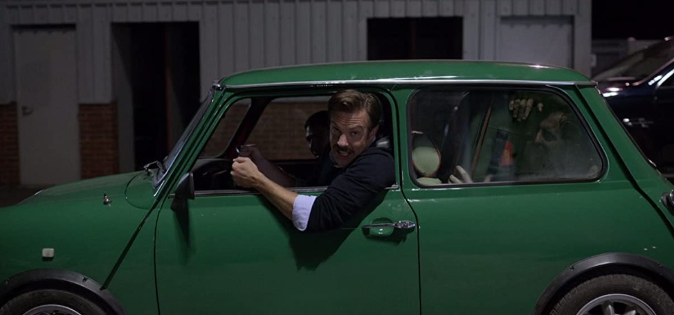 ted lasso in green car