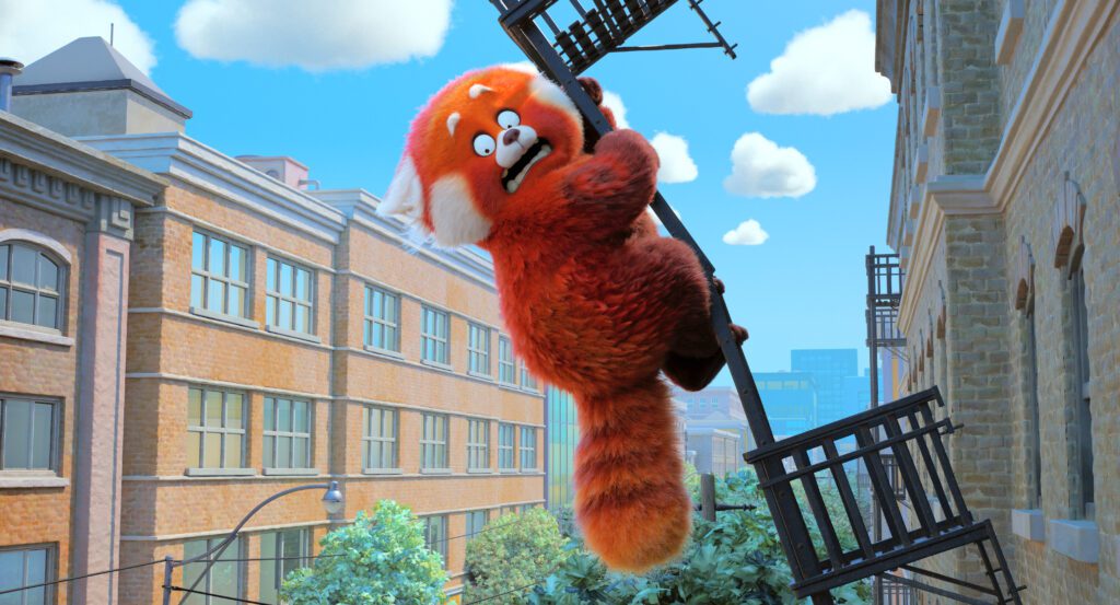 turning red giant red panda hanging off building