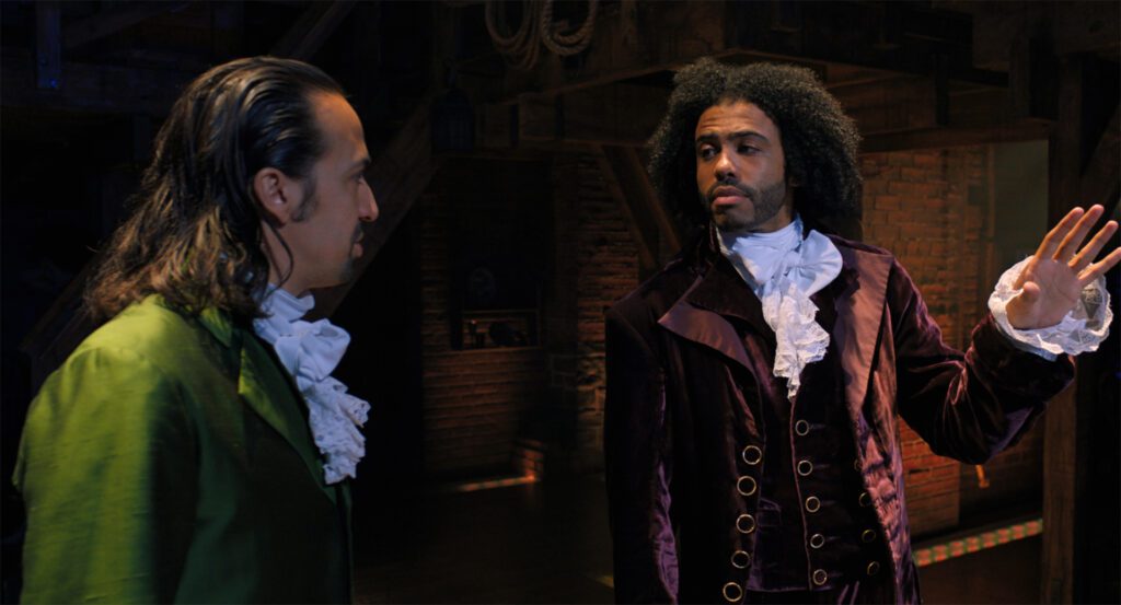 Lin-Manuel Miranda is Alexander Hamilton and Daveed Diggs is the Marquis de Lafayette in HAMILTON, the filmed version of the original Broadway production.