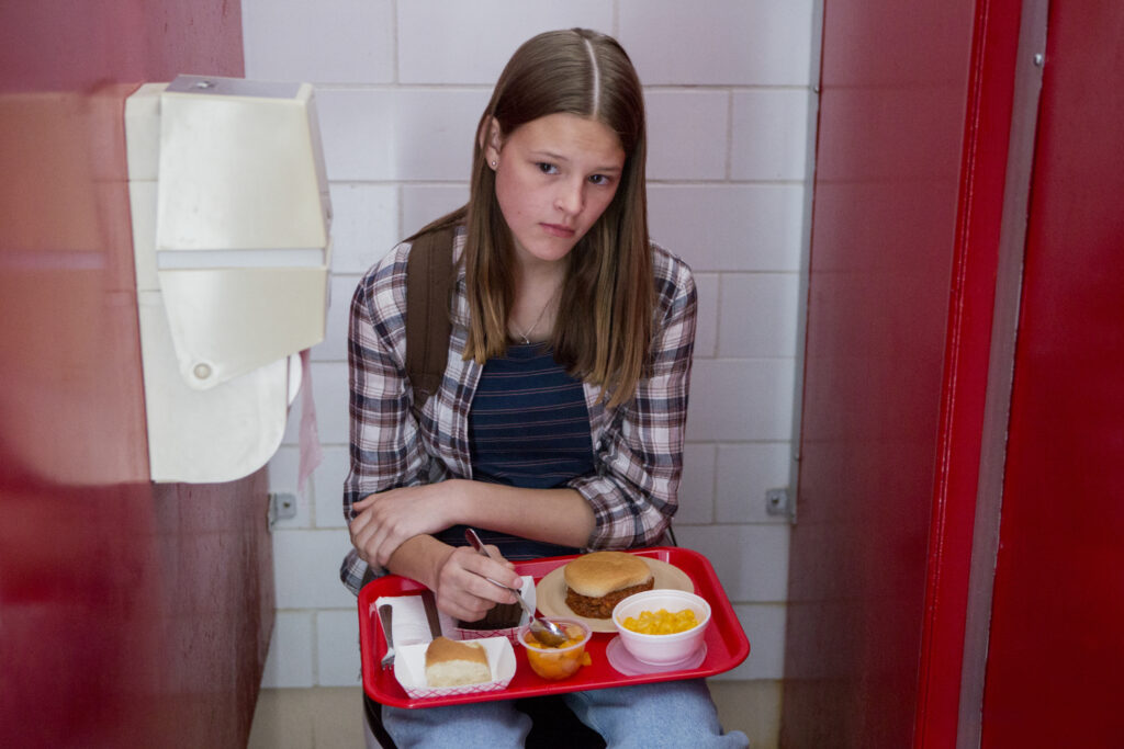 Kate Messner eats lunch in the bathroom stall while overhearing a conversation about the latest rumors about her. everything sucks