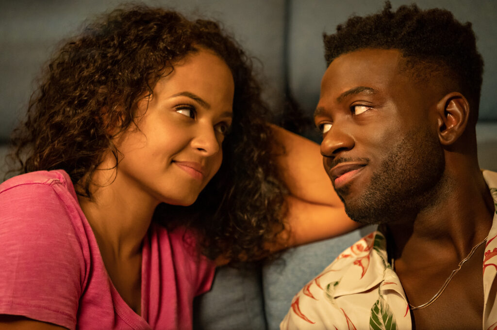 Erica (Christina Milian) and Caleb (Sinqua Walls) grow closer together when he visits her room for a night.
Resort To Love