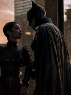 The Batman and Batwoman rise in the dark knight movie.