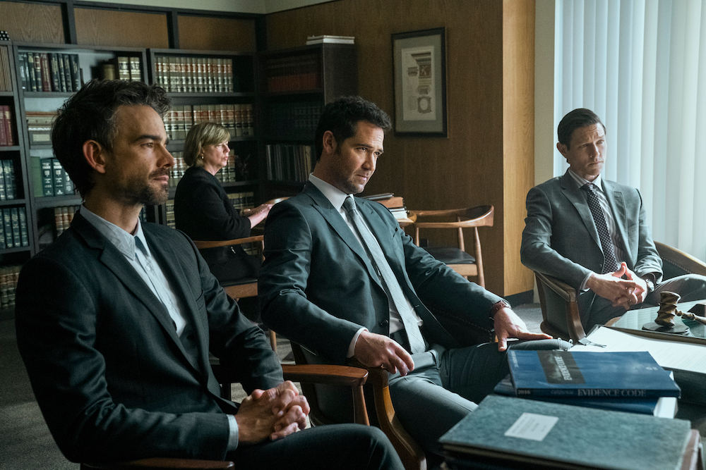 Trevor, Mickey, and Golantz in the lincoln lawyer