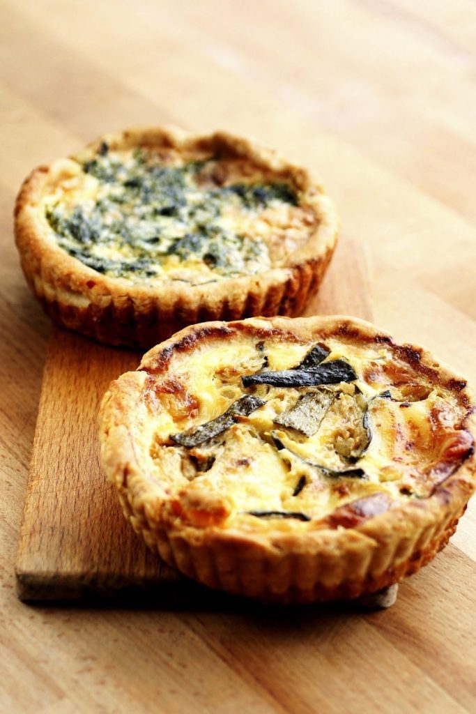 Quiche on wooden table