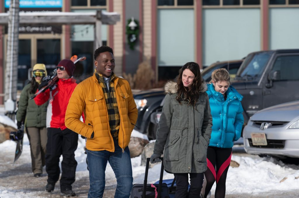 Marcus walks with Kat and Serena as they go to the Pinecrest Ice Arena. 
