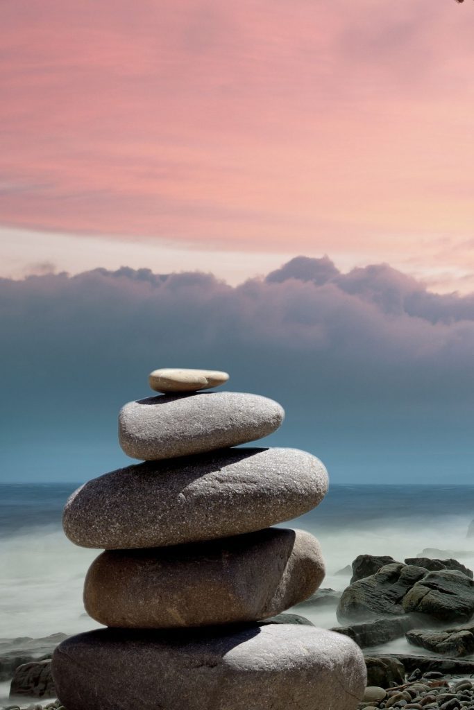 Stacked Rocks And Sunset