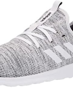 Women's adidas running shoes in grey and white, perfect for pairing with skinny jeans.