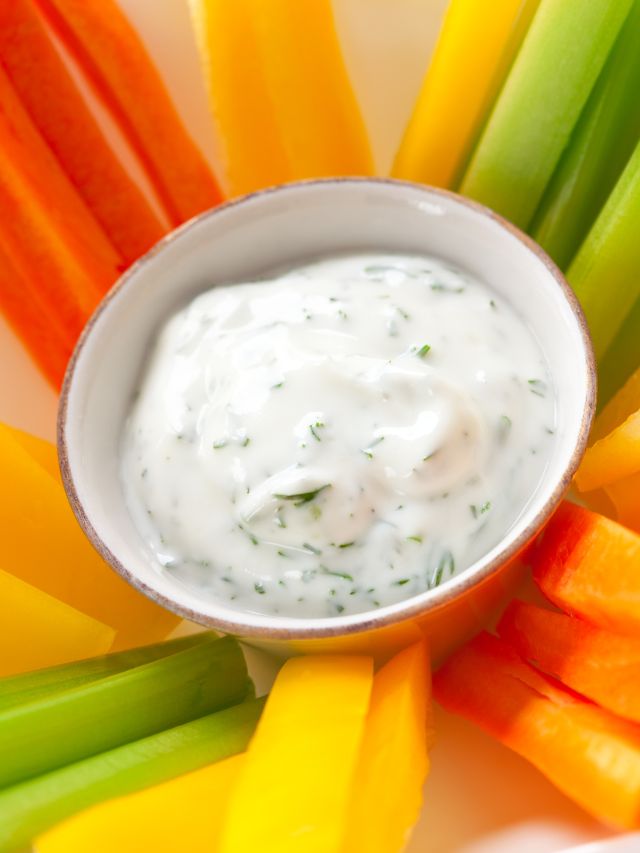 platter of assorted fresh vegetables with dip