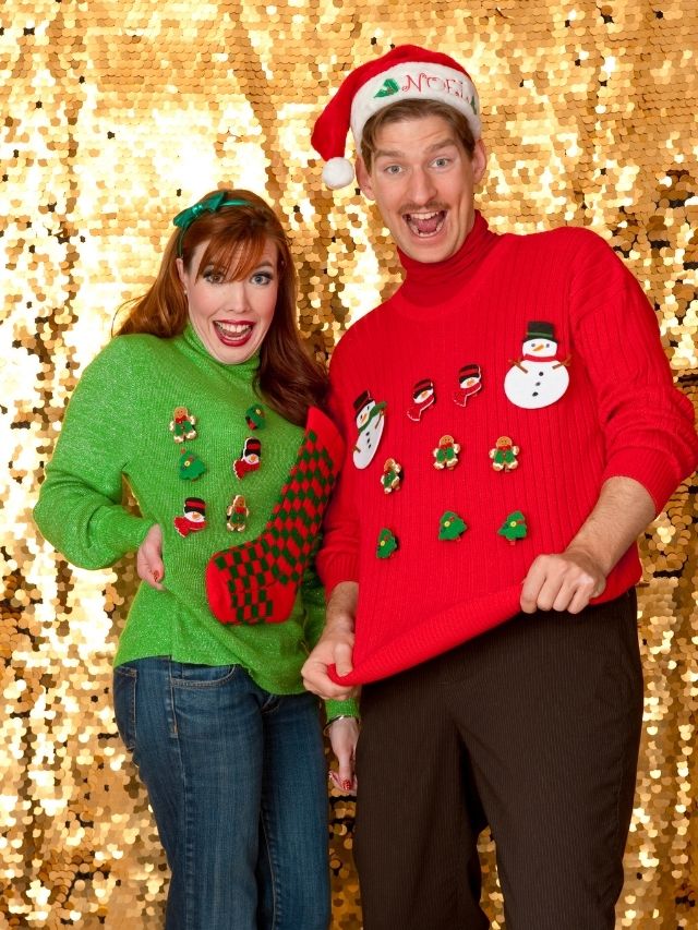 man and woman in christmas sweaters
