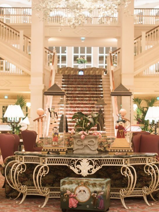 fancy Disney hotel with a grand staircase
