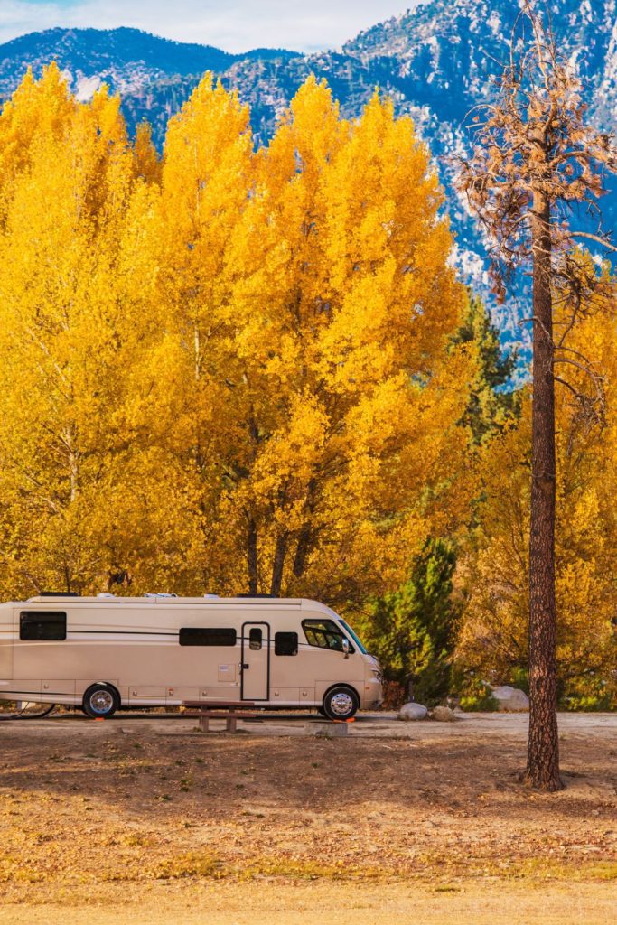 motorhome set up in California mountains during the fall