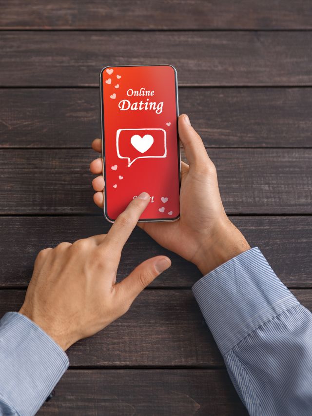 hands with phone, online dating on screen