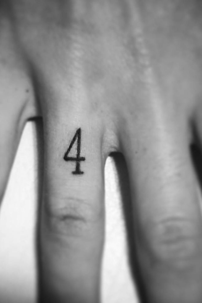 finger tattoo of the number 4