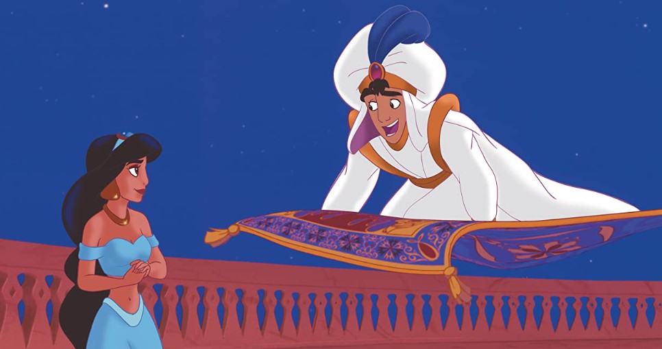 Aladdin on a magic carpet talking to Jasmine in the movie Aladdin