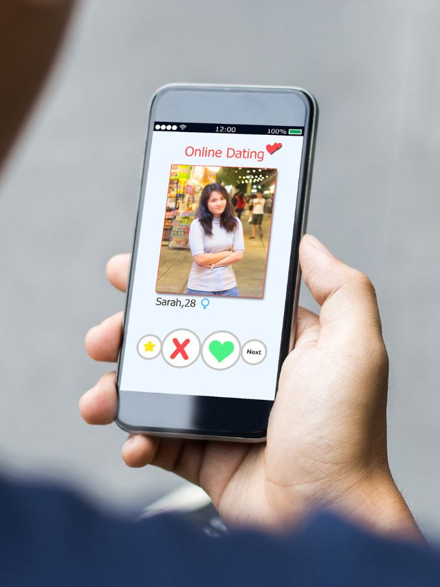 phone with online dating on screen