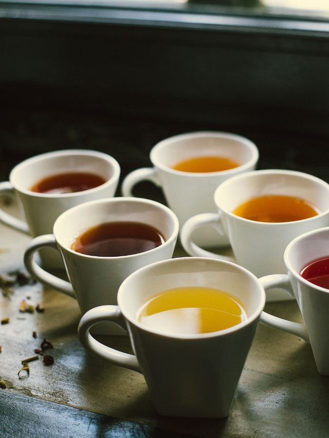 colorful teas in cups 