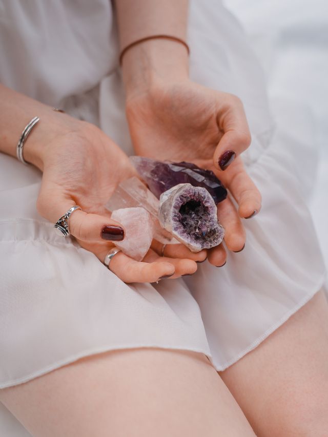 woman holding crystals