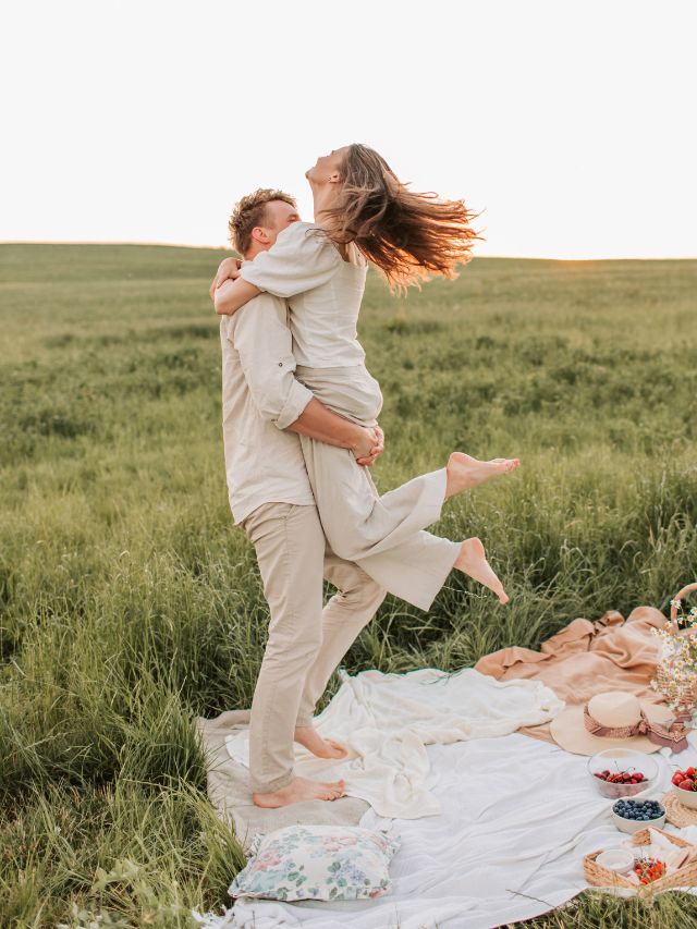 couple on picnic in field