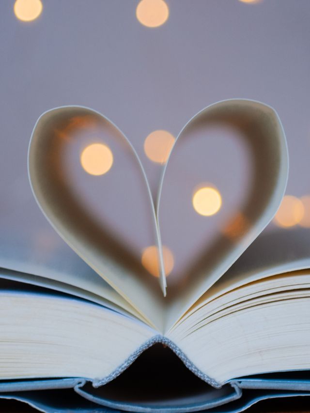 pages in book forming  heart