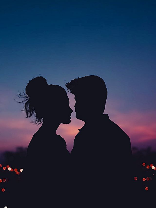 couple with sunset in background