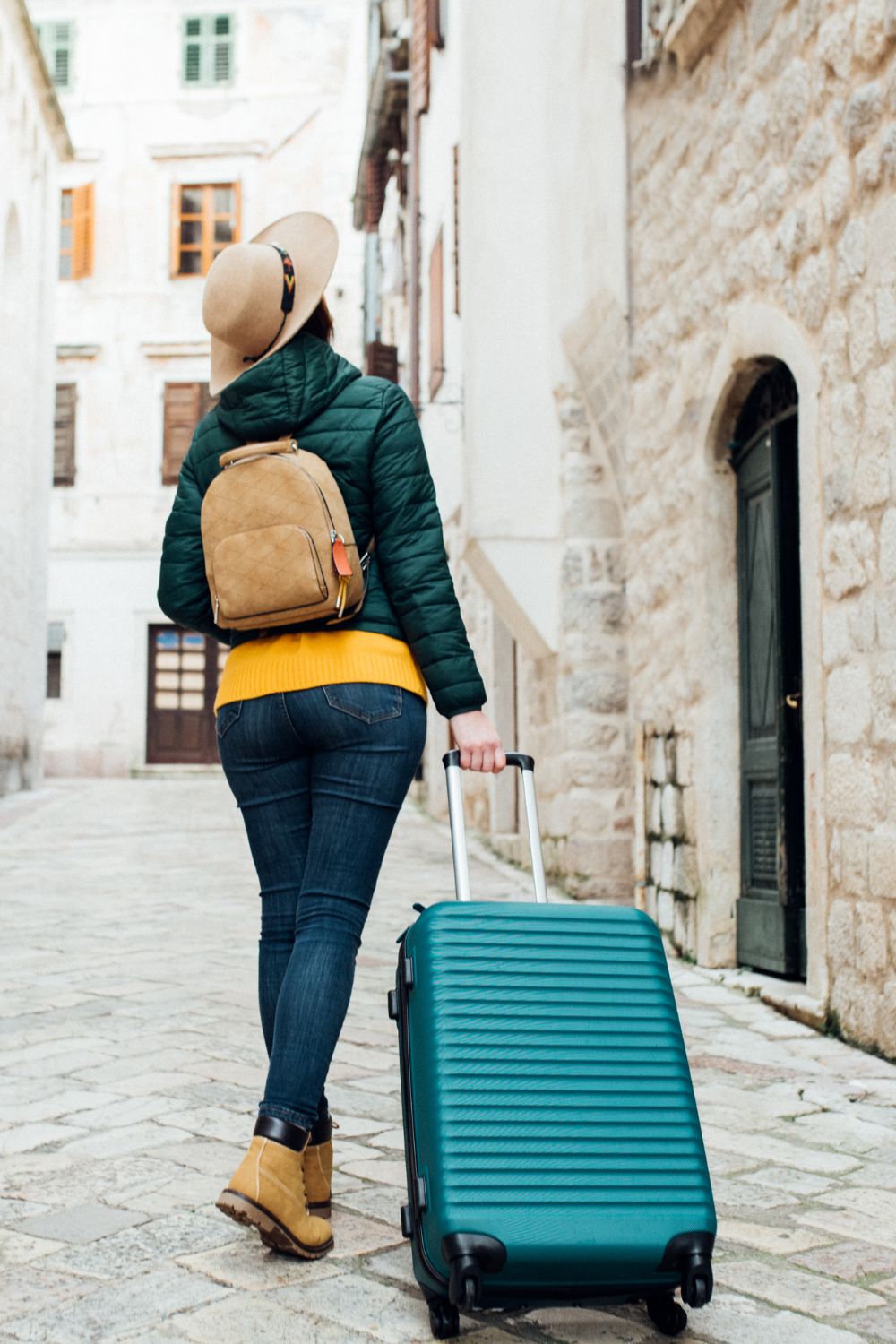 Woman Carrying Luggage