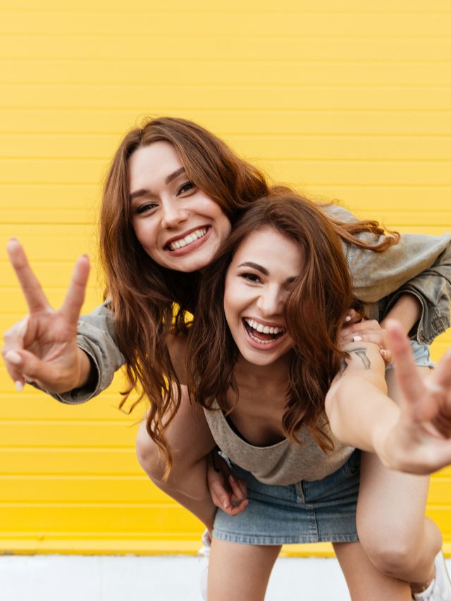 two young women friends having fun