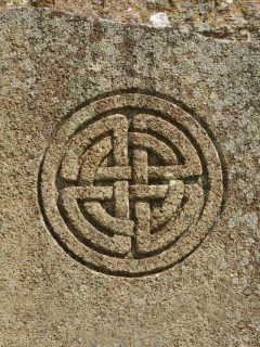 a celtic symbol engraved into the wall