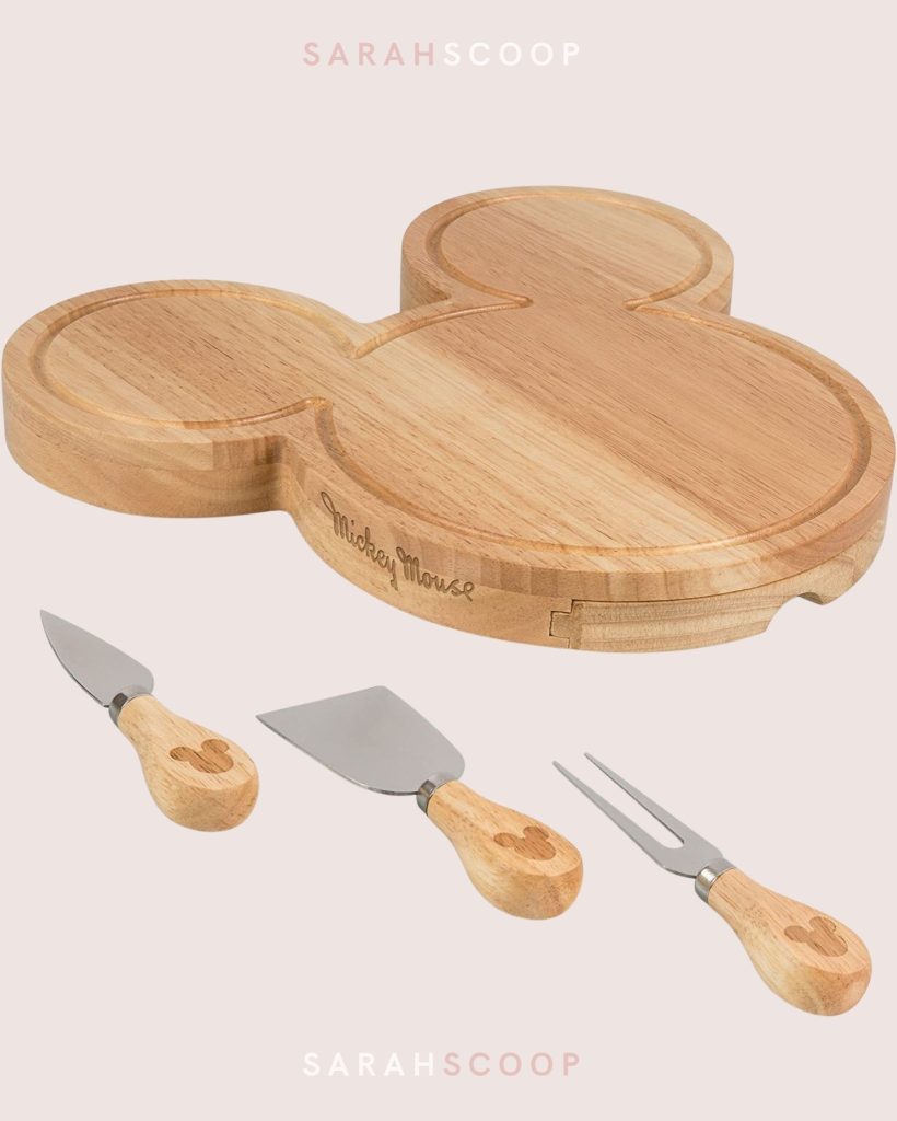Mickey mouse head shaped charcuterie board with 3 cutlery utensils