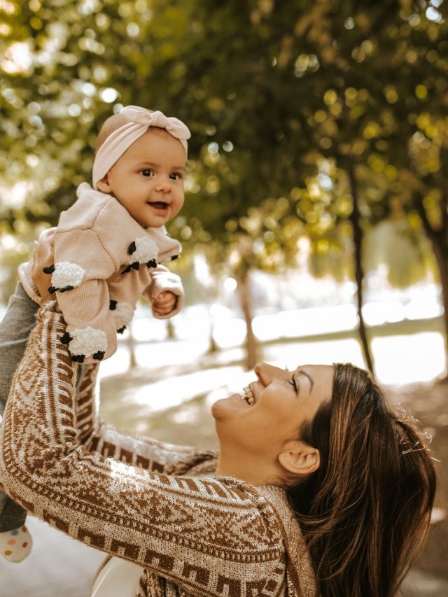 happy woman with baby