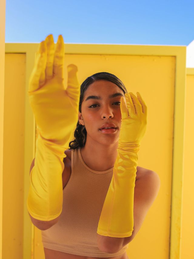 woman with yellow gloves