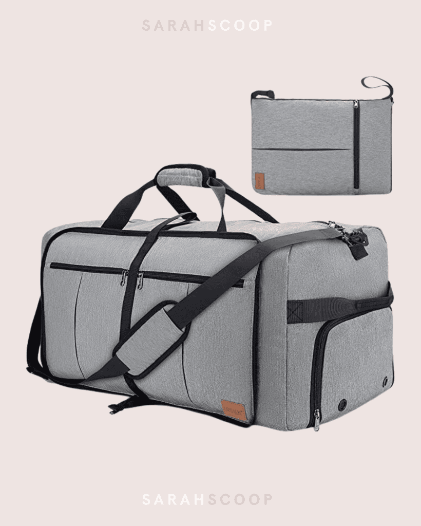 Grey 100L duffle bag with various storage compartments and black trim