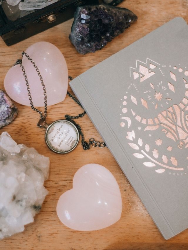 journal, crystals, and necklace