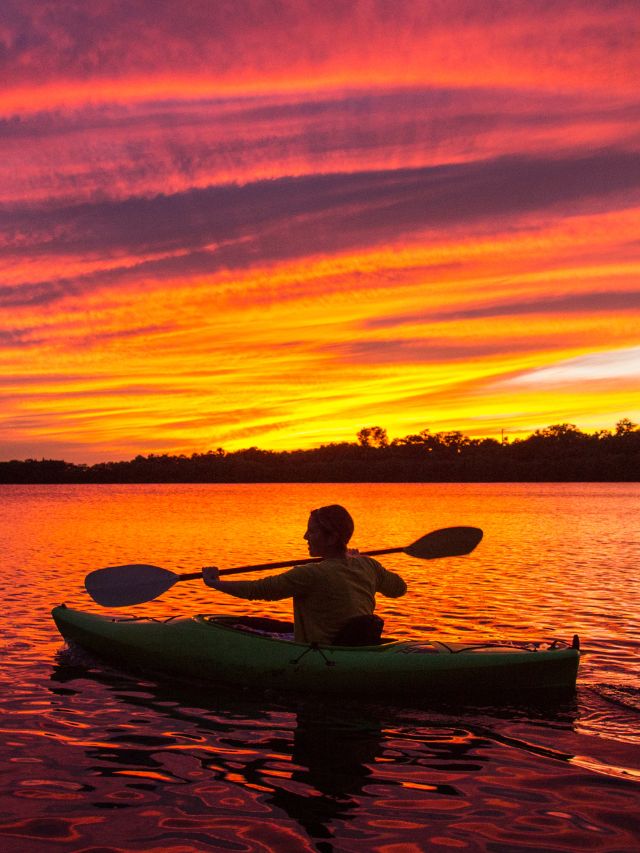 kayaking with a sunset