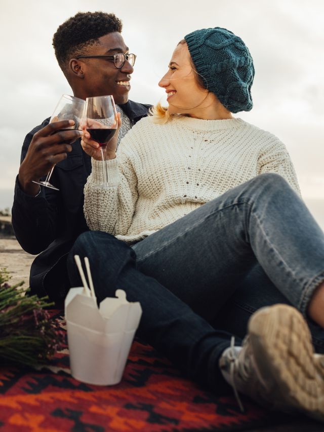 couple with wine and takeout