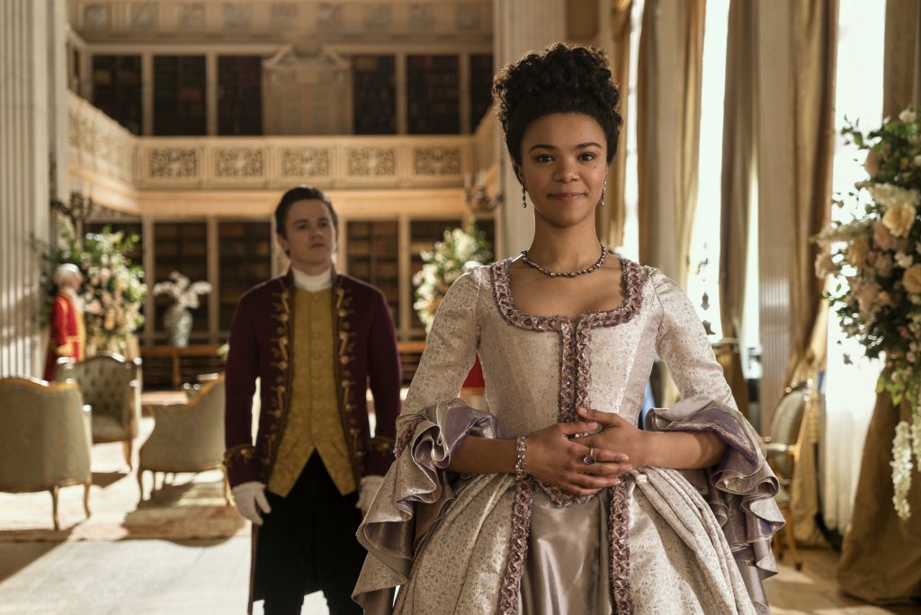 Queen Charlotte: A Bridgerton Story. (L to R) Sam Clemmett as Young Brimsley, India Amarteifio as Young Queen Charlotte in episode 102 of Queen Charlotte: A Bridgerton Story.