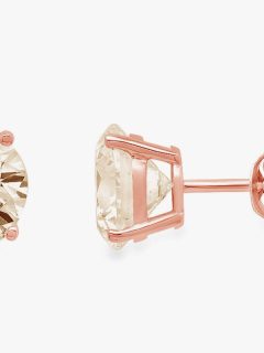 Rose gold plated designer diamond stud earrings.